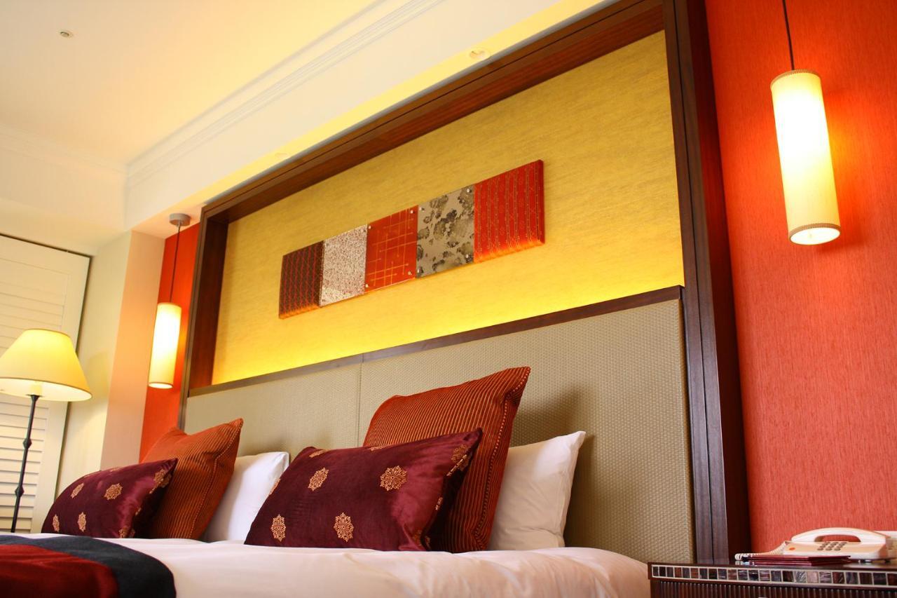 Hotel Nikko Alivila Yomitan Exterior foto A room at the hotel